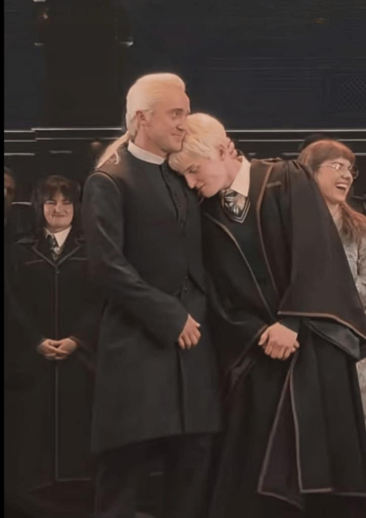 Tom Felton as Draco Malfoy huging his son Scropius on Brodway after show